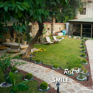 Garden path leading through greenery at Smile Center Turkey.